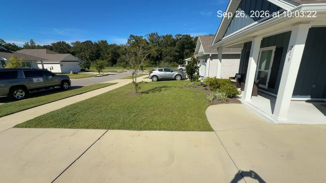 Front yard after mowing, trimming, and edging